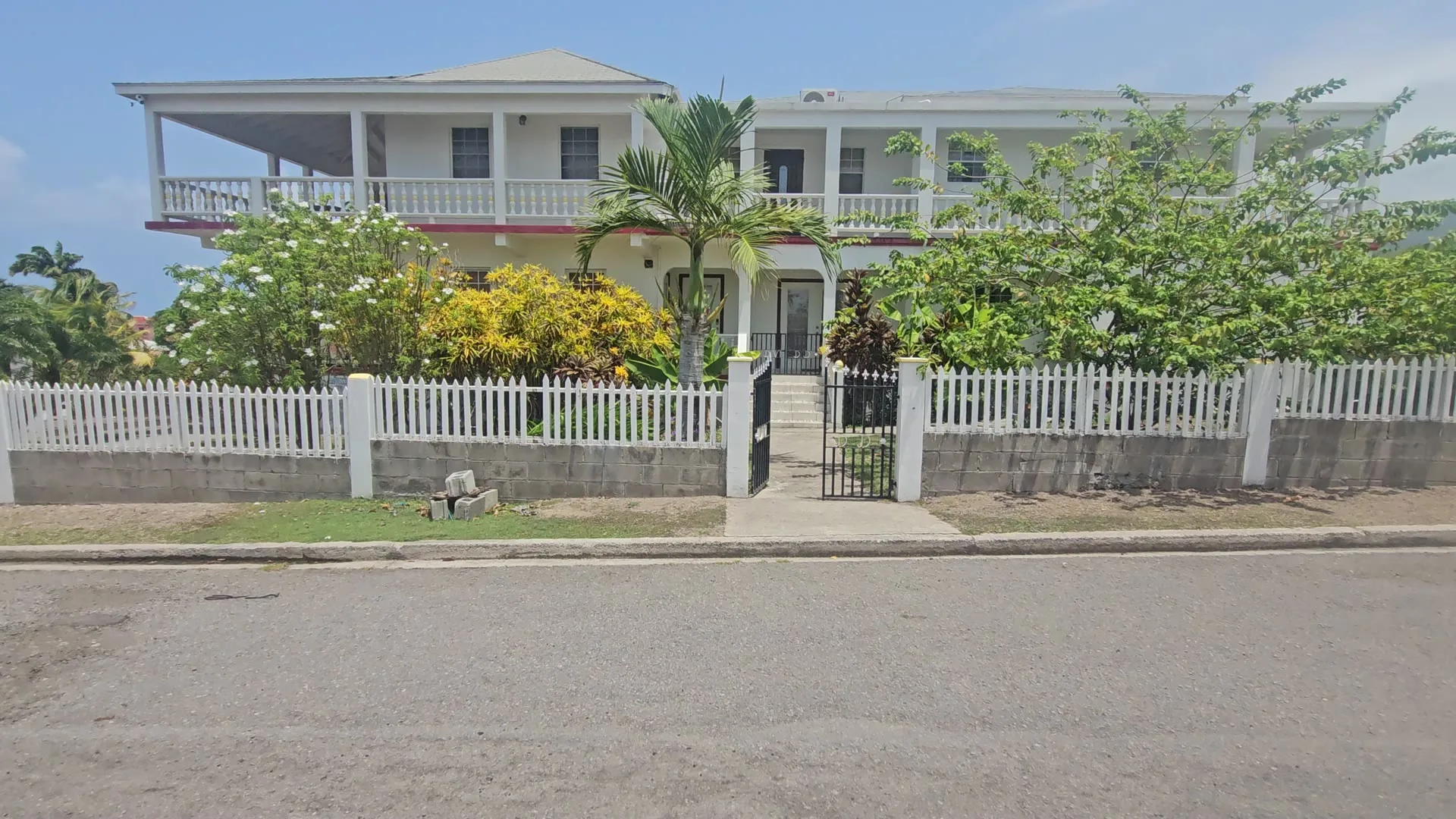 Compassionate Touch Spa & B&B website homepage, showing the property's ocean-view treatment rooms in Newcastle, Nevis